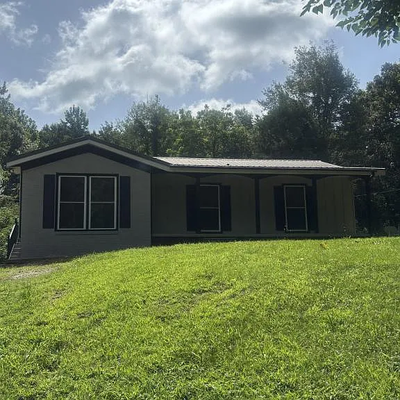 135 Wilbur Nelson Rd — Photo 1