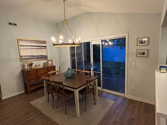 Dining area with sliding glass door to side yard