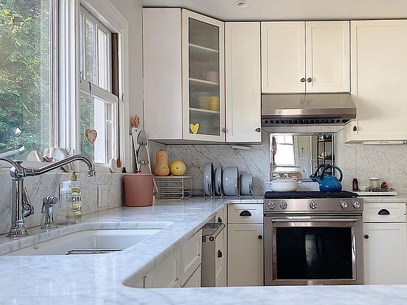marble counters and back splash, reverse osmosis water filtration. top of the line appliances and fixtures!