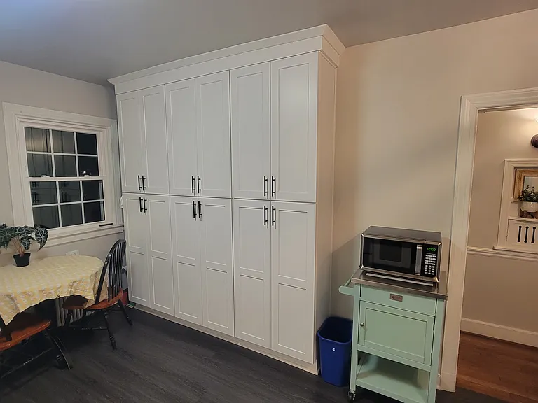 Eat in kitchen with lots of cabinet storage.