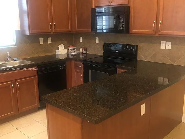 1129 SW 147th Ter #1129 — Photo 13