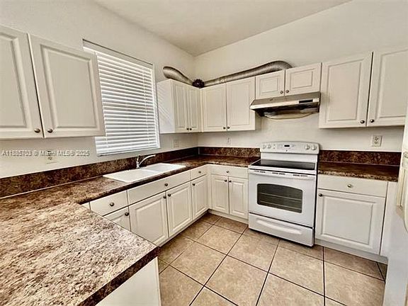3rd image of 12842 SW 135th St #Townhouse 12842