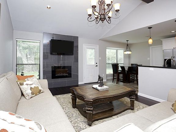 Living area is classic & traditional, yet exudes a contemporary and modern feel with the open floor 