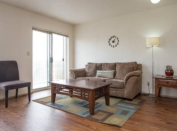 The living room couch and coffee table