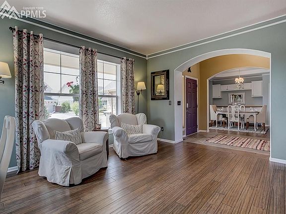 Office/Library with arched entry and lots of natural light