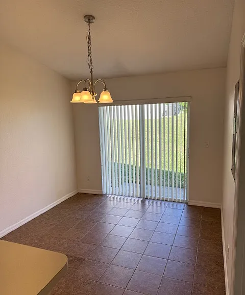 Dining area with views of the pool