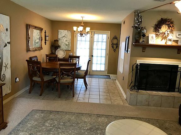 Dining area w/ French doors leading out onto private fenced in patio