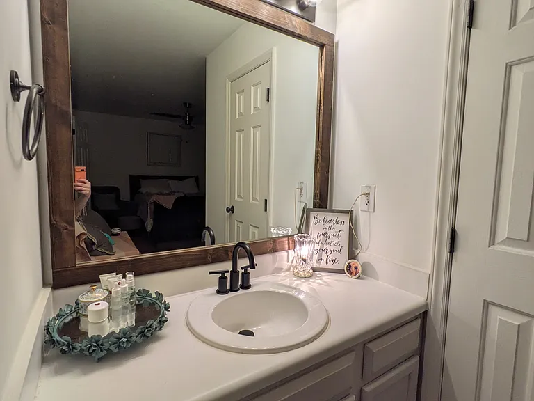 Additional vanity adjacent to the master bedroom and walk-in closet