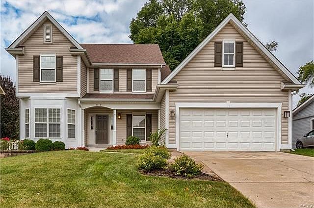 Welcome to 1139 Vinetta Drive - A beautiful 1.5 story custom home in a wonderful walkable area of Des Peres