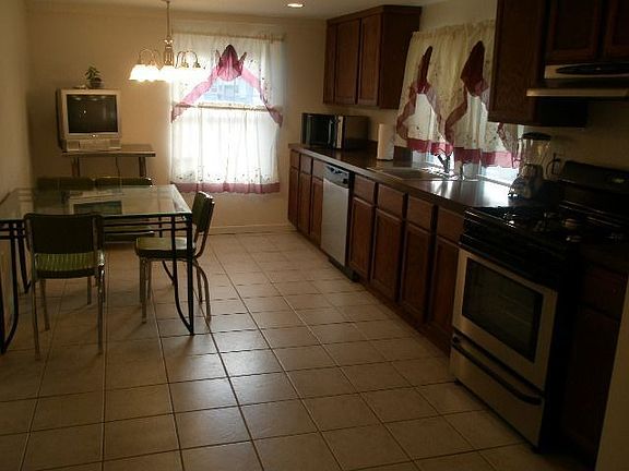 Eat in Kitchen with stainless steel appliances