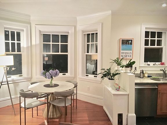 The dining area, with bay window and open floor plan.