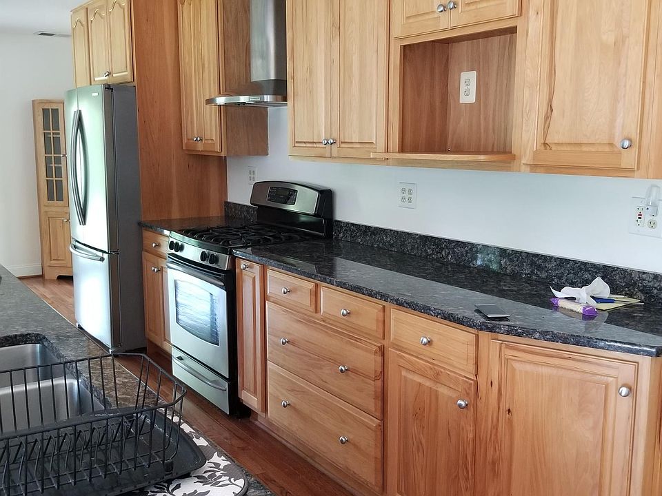 Kitchen which also has a breakfast bar counter height with s