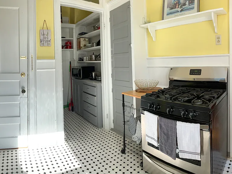 [Kitchen] Extended pantry with cabinets.