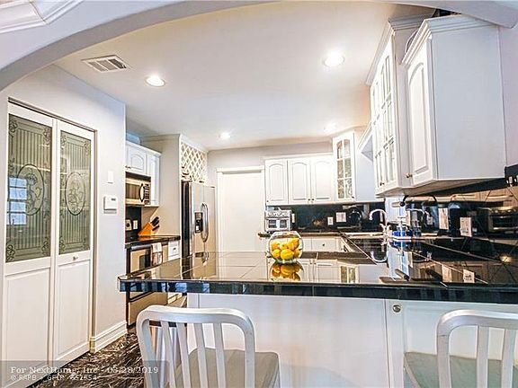 5th image of 16815 Royal Poinciana Dr