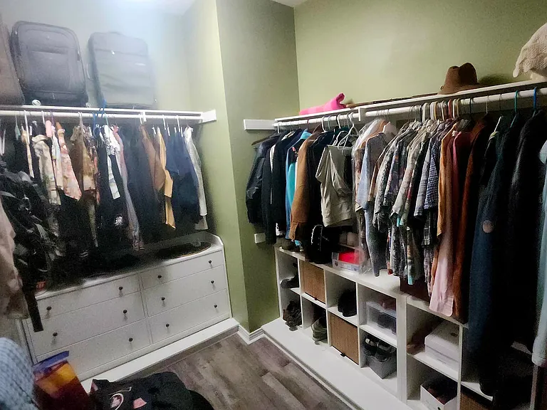 Very large walk in closet with nice built ins.