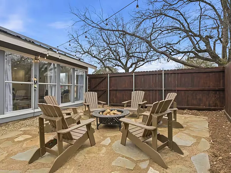 South side yard with fire pit.