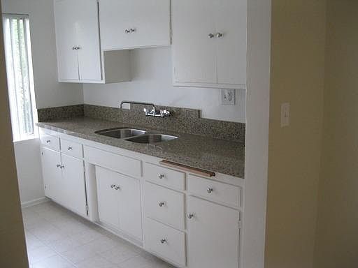 Spacious kitchen with new granite counter tops