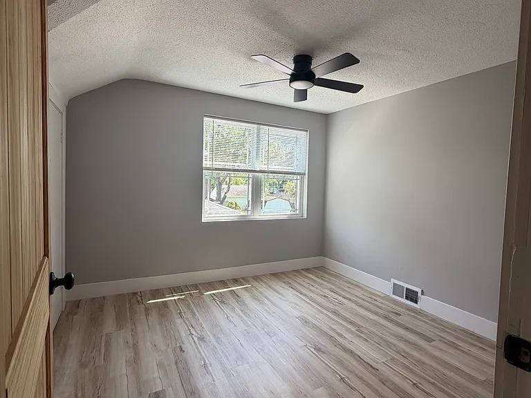 Four additional spacious bedrooms 6/6 of varying sizes, each with ceiling fan and excellent natural light