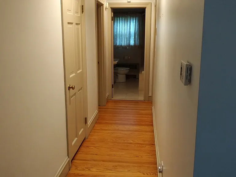 Hallway leading to two bedrooms