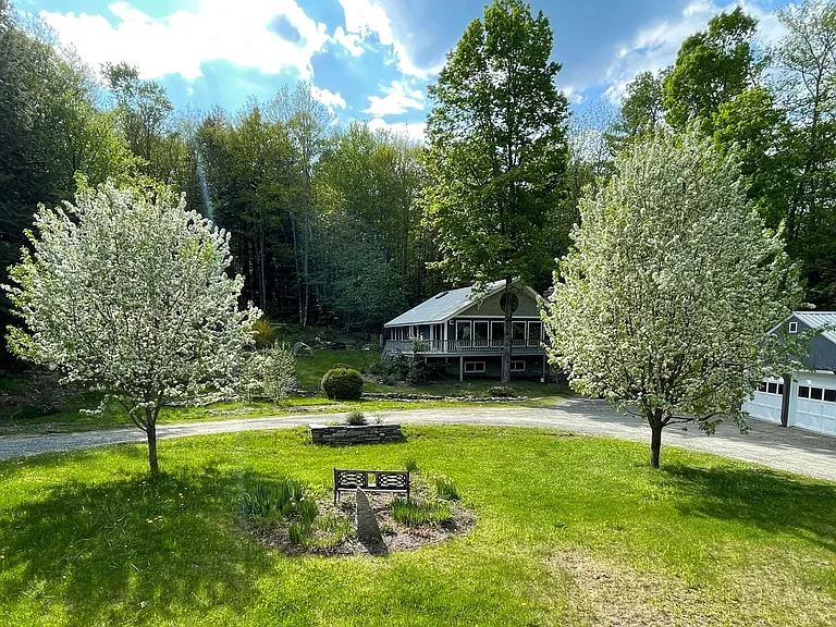 Circular driveway with two car garage