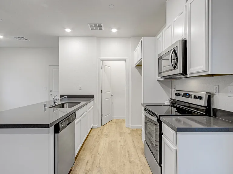 kitchen and walkin kitchen storage dishwasher , over and range