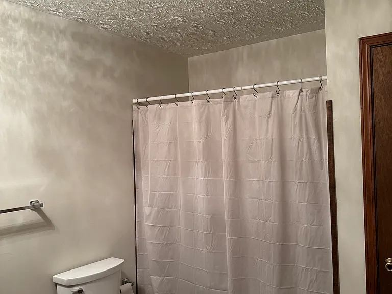 Hall bath with linen closet