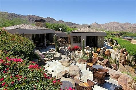 Spa and fire pit carved into the mountains