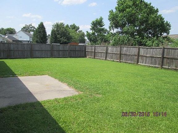 fenced back yard