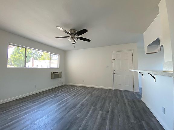 Frontroom looking at front door and window