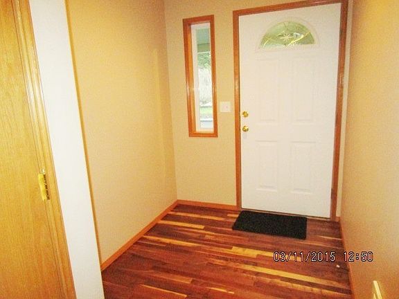 Foyer. Newly painted, wood flooring.