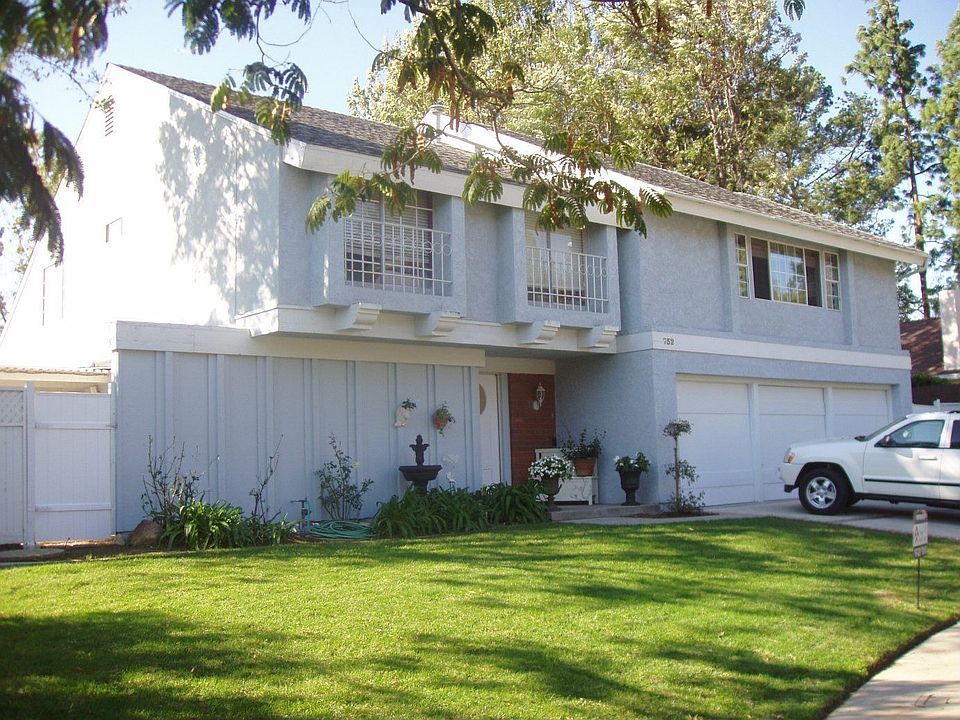 Front of house, large yard
