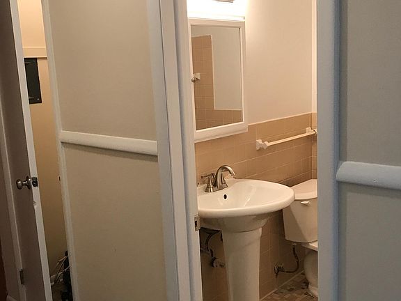 Bathroom and large storage closet.