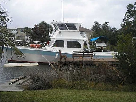 Boat Dock with Lift and Jet Ski Ramp