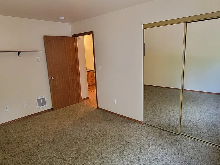 Bedroom with built in closet
