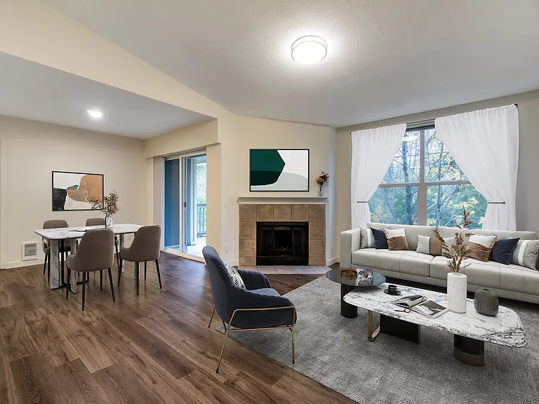 Renovated Package I dining and living room with hard surface flooring
