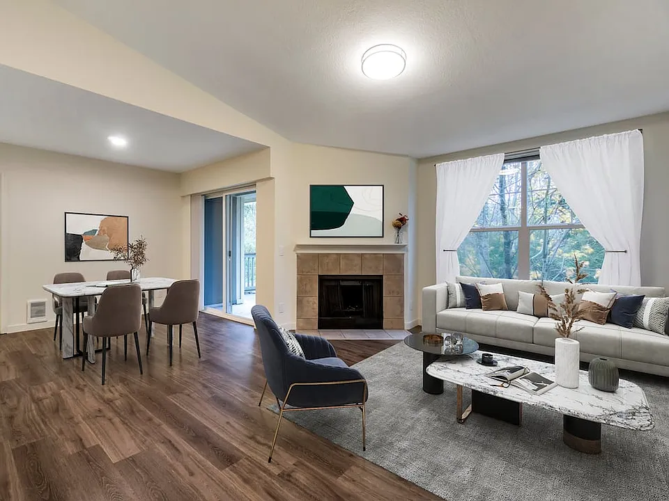 Renovated Package I dining and living room with hard surface flooring