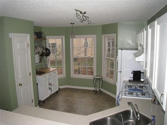 Refurb kitchen with new stone counter tops and appliances