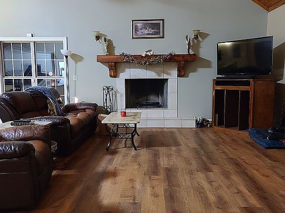 Wood burning fireplace in Greatroom