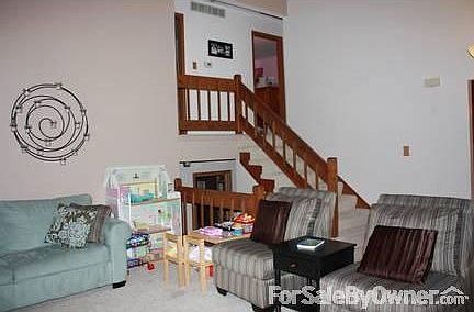 Living Room : Open and inviting living room with vaulted ceilings