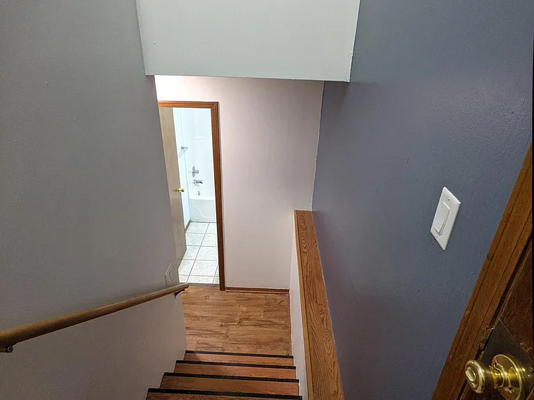 Entry, stairway to garden level.