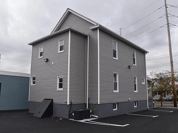 PARKING SPACES AND BACKYARD