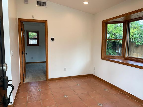 Entry looking into living room towards bedroom.