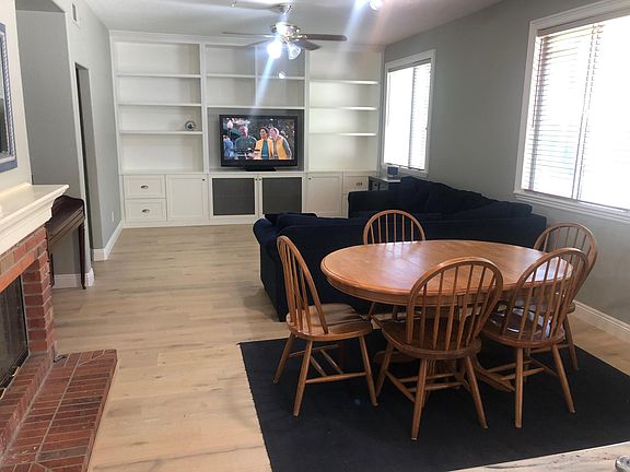 Back room with fireplace and built in entertainment center