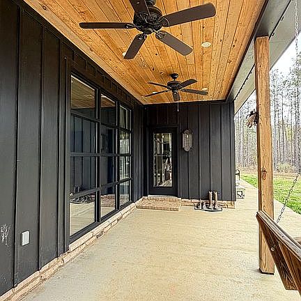 Side Entrance w/patio 