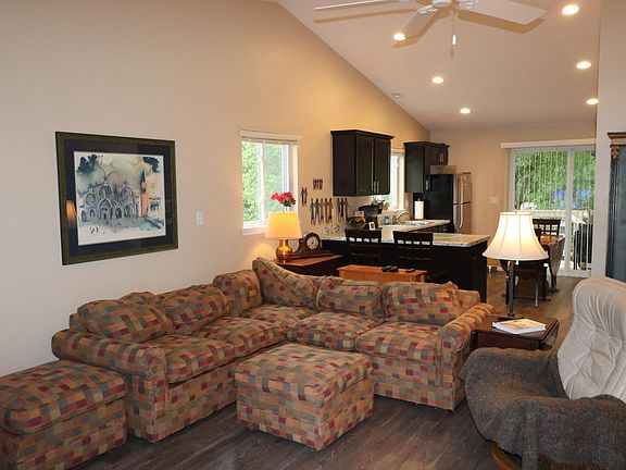 living room , kitchen behind living, then out to nice big de