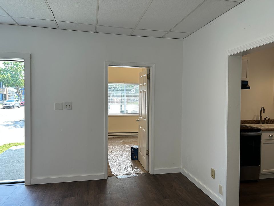 Living room looking towards bedroom and kitchen