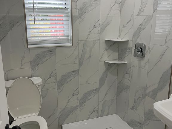 bathroom by kitchen