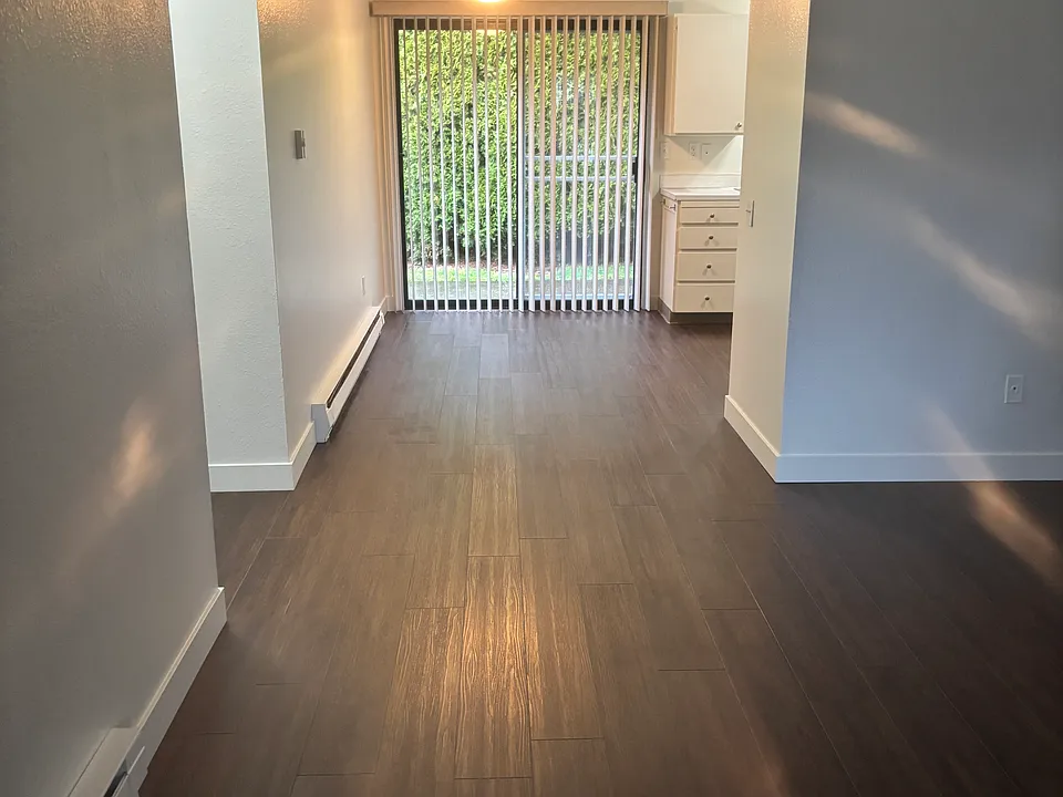 From living room into eating space in kitchen