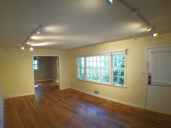 Spacious LR, picture window, hardwood floors completely refinished 2011
