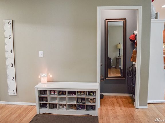 ENTRANCE WAY AND AN ADORABLE CLOSET NOOK W/ SHOE SHELVES AND COAT HOOKS SOOOOO CLEVER!!!!!